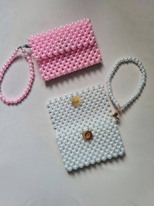 white & pink card holder