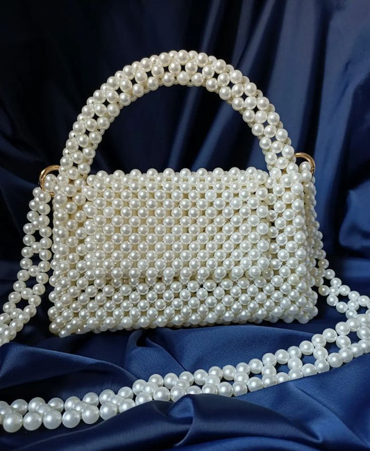 white pearl bag with belt